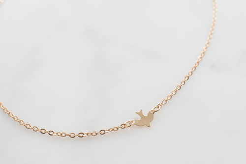 Collier oiseau en or